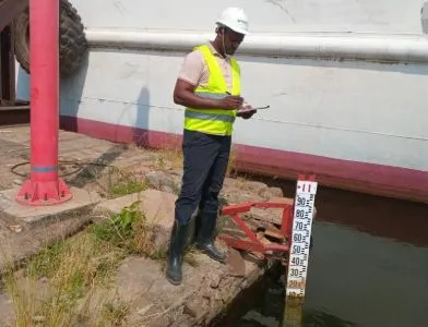 Reservoir gauge reading and monitoring